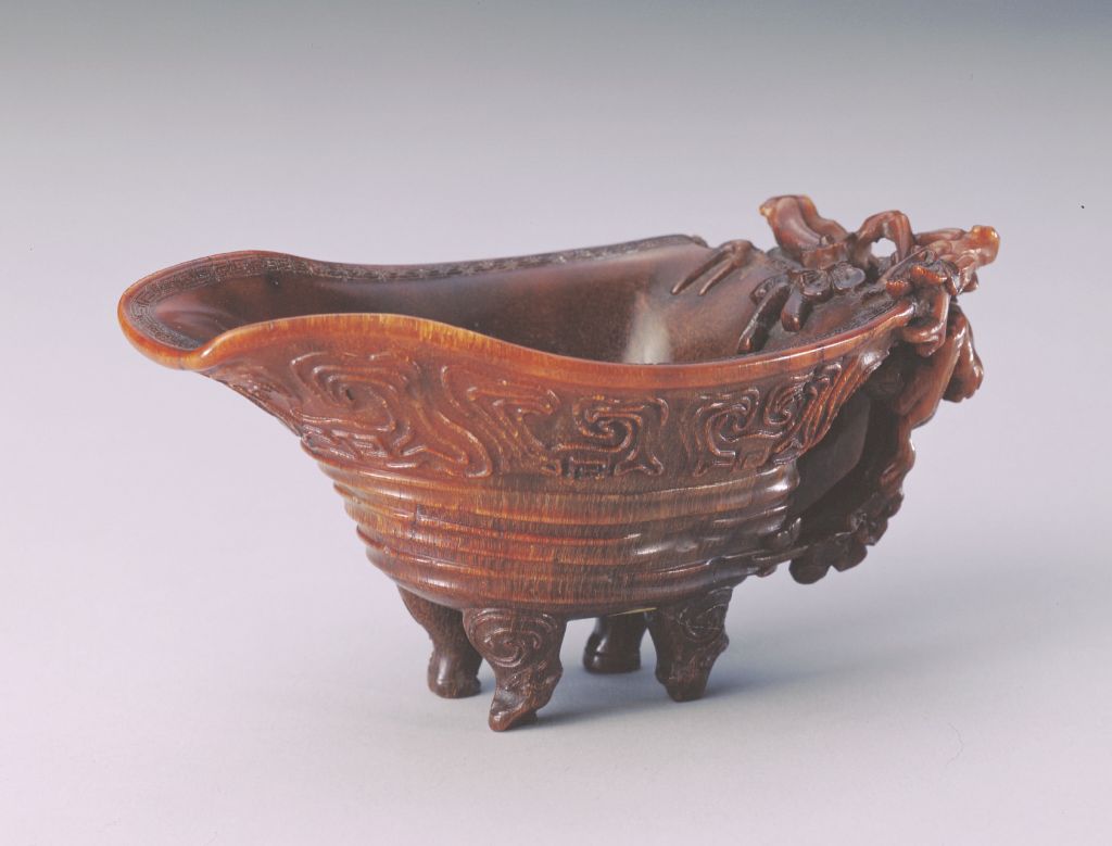 图片[1]-Rhinoceros horn carved plum branch antique pattern four-legged cup-China Archive